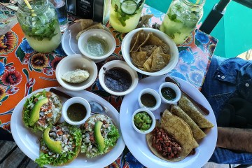 a table topped with plates of food on a plate